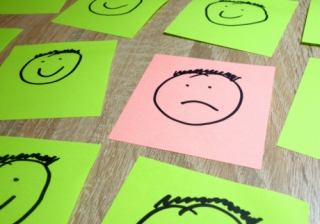 happy sad faces paper up down positive negative