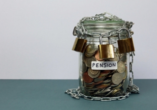 jar of money protected by chain and lock