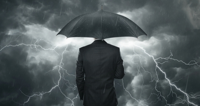 businessman adviser umbrella warn storm