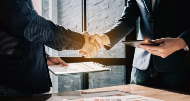 deal agreement business hand handshake acquire